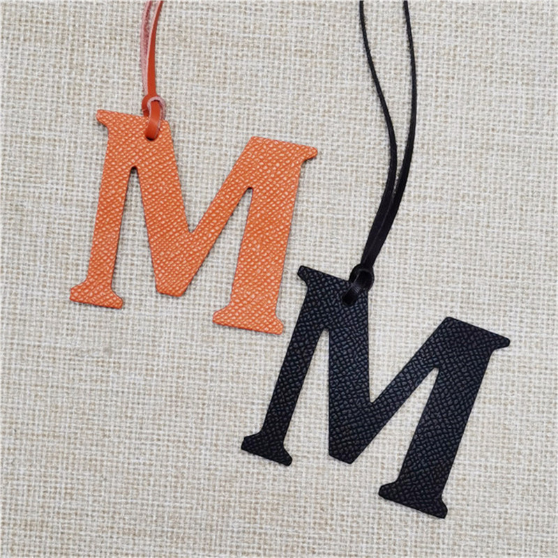 XMESSUN Nuevo Llavero con Letr - Monogram Keychain Leather reseña y precio